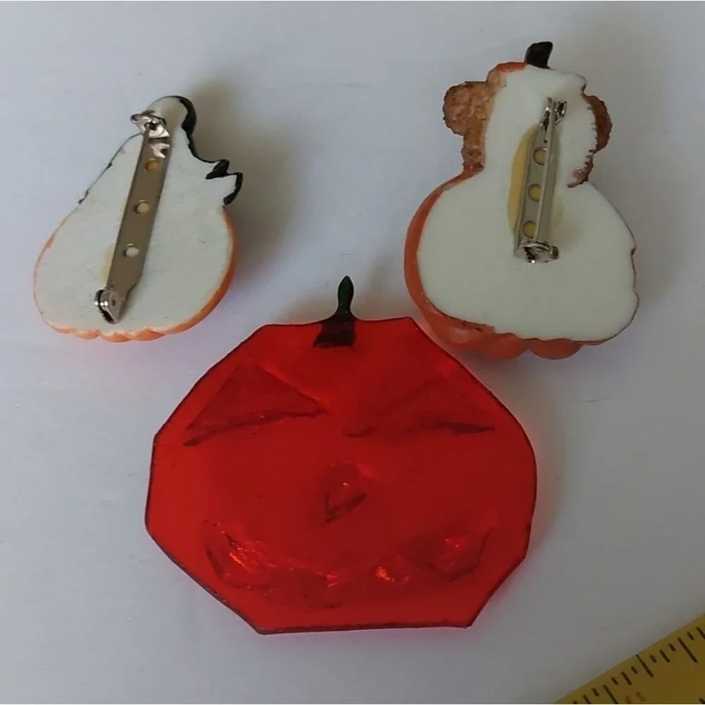 Vintage pumpkin brooches